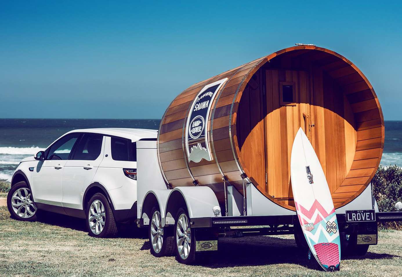 Rear of the Adventure Sauna with surfboard